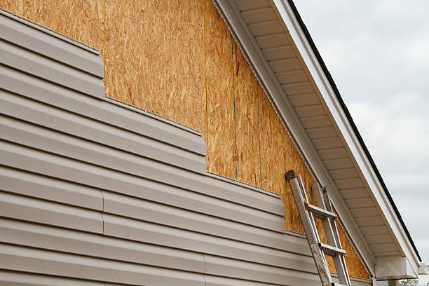 Professional Emergency Siding Repair technician working in Fairview, OR
